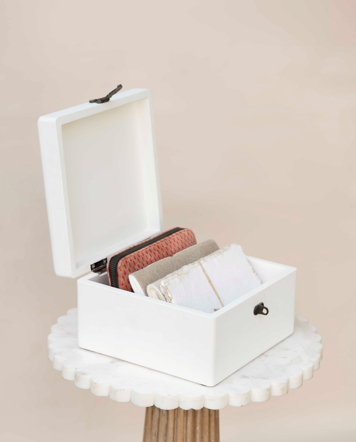 White wooden jewelry box or decorative box with open lid