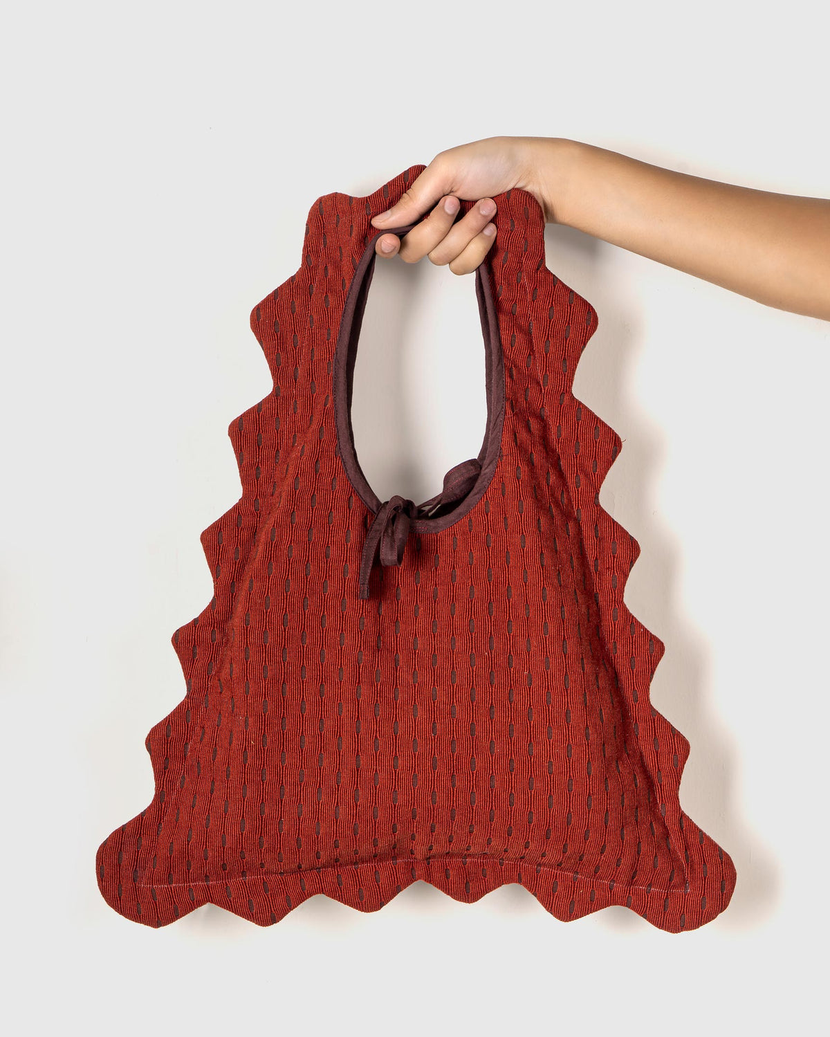 Red textured tote bag