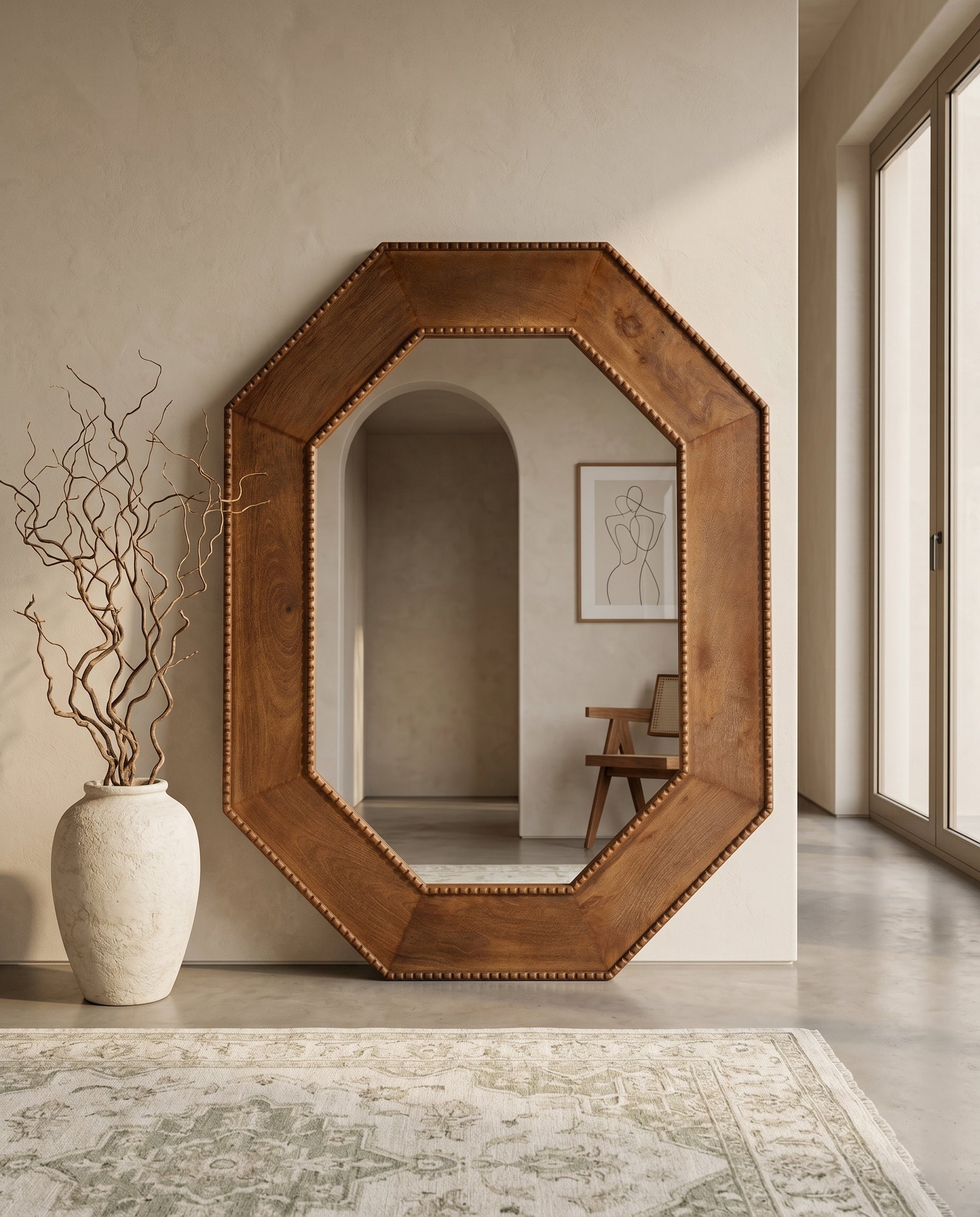 Decorative interior with an octagonal mirror, console table, and lamp by contrast living