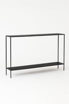 Black console table on a white background