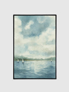 Framed artwork of a seascape with sailboats and a cloudy sky.