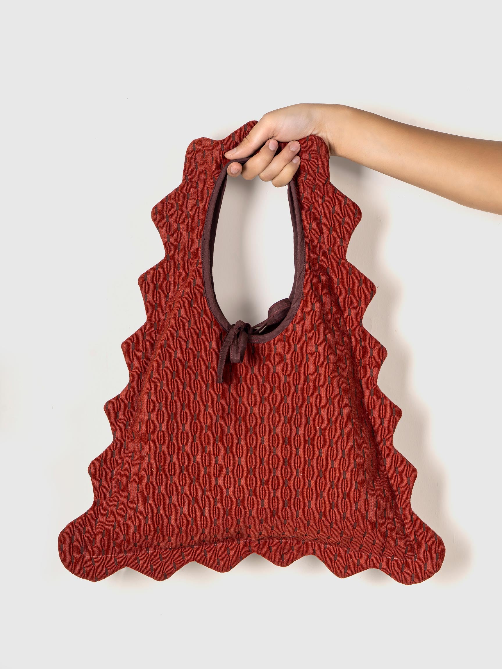 Red textured tote bag 